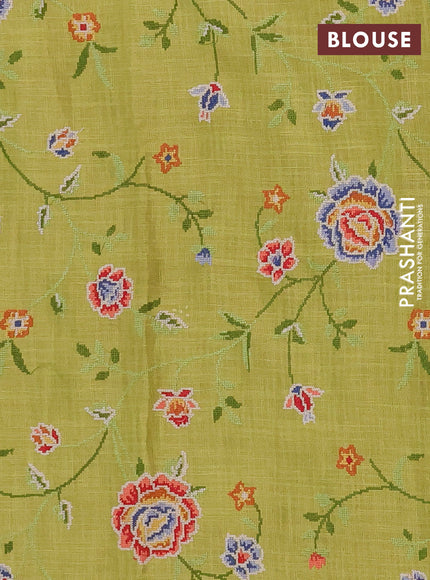 Art linen saree lime green with embroidery mirror work buttas and convent embroidery pallu