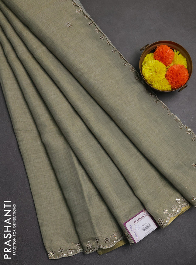 Art linen saree military green with embroidery mirror work buttas and convent embroidery pallu
