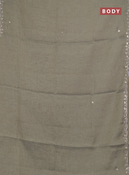 Art linen saree military green with embroidery mirror work buttas and convent embroidery pallu
