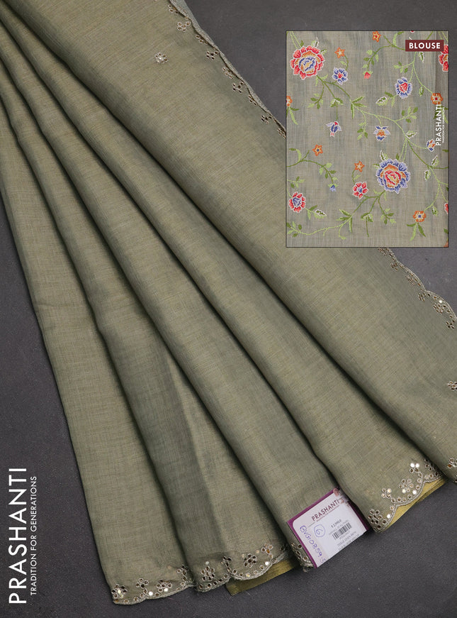 Art linen saree military green with embroidery mirror work buttas and convent embroidery pallu
