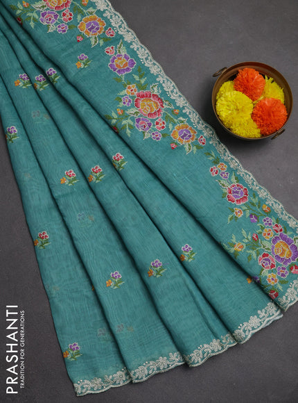 Art linen saree teal blue with allover convent embroidery buttas and embroidery border