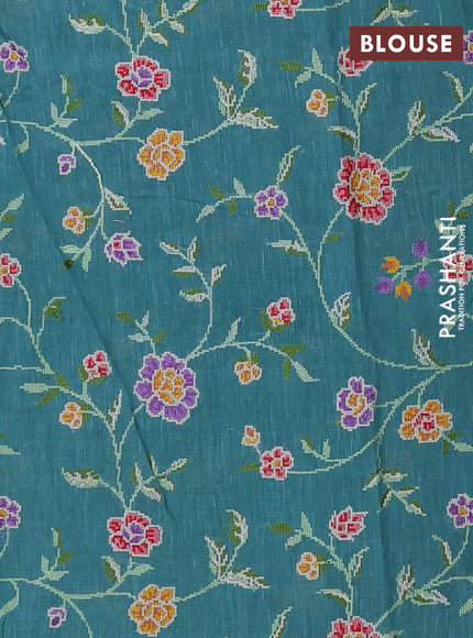 Art linen saree teal blue with allover convent embroidery buttas and embroidery border