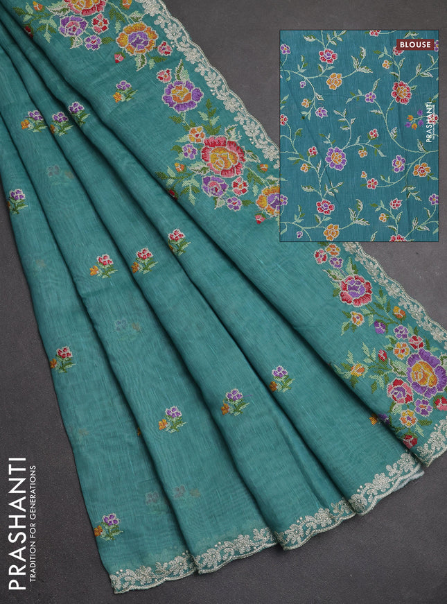 Art linen saree teal blue with allover convent embroidery buttas and embroidery border