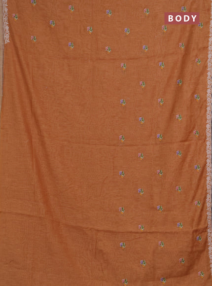 Art linen saree orange shade with allover convent embroidery buttas and embroidery border