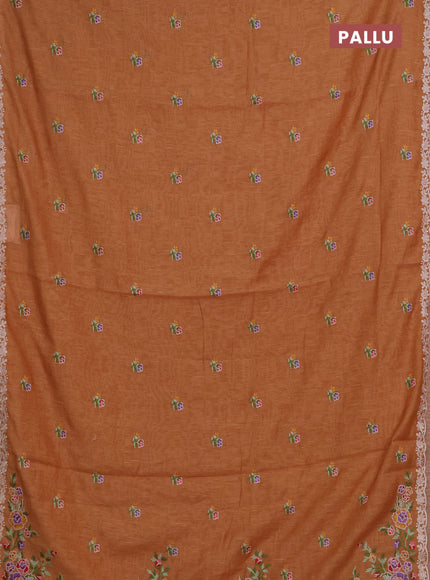 Art linen saree orange shade with allover convent embroidery buttas and embroidery border
