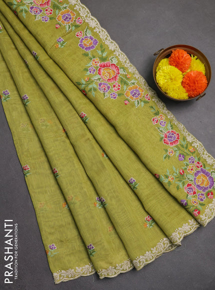 Art linen saree light green with allover convent embroidery buttas and embroidery border