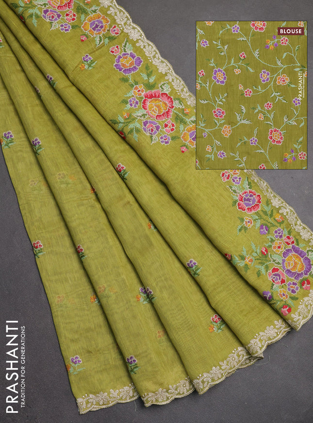 Art linen saree light green with allover convent embroidery buttas and embroidery border