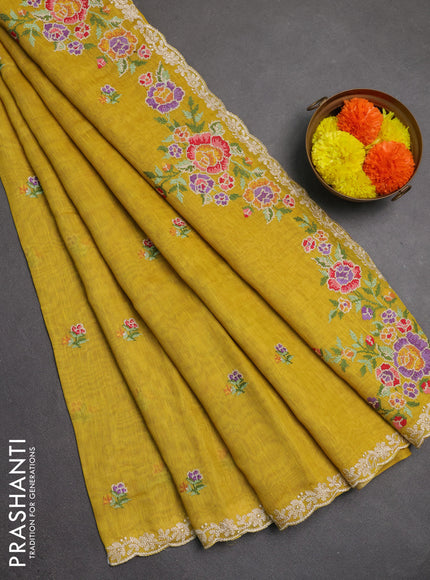 Art linen saree mustard yellow with allover convent embroidery buttas and embroidery border