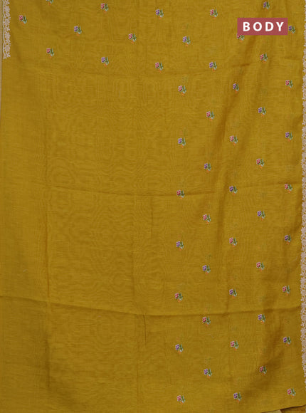 Art linen saree mustard yellow with allover convent embroidery buttas and embroidery border