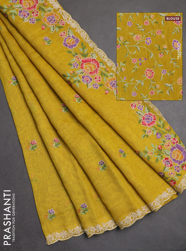 Art linen saree mustard yellow with allover convent embroidery buttas and embroidery border
