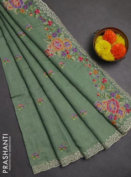 Art linen saree pastel green with allover convent embroidery buttas and embroidery border