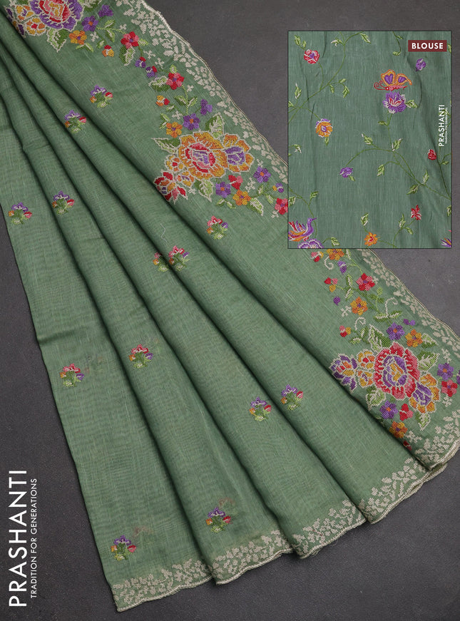 Art linen saree pastel green with allover convent embroidery buttas and embroidery border