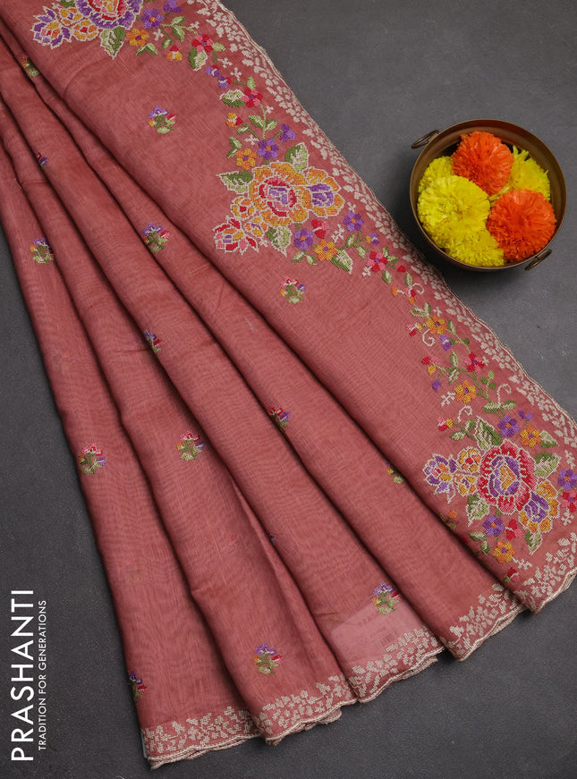 Art linen saree peach shade with allover convent embroidery buttas and embroidery border