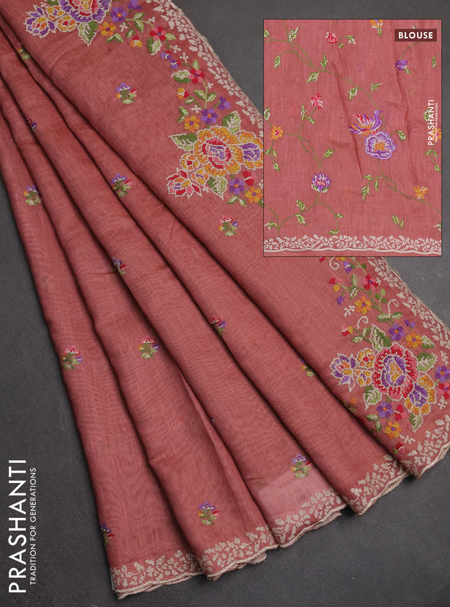 Art linen saree peach shade with allover convent embroidery buttas and embroidery border
