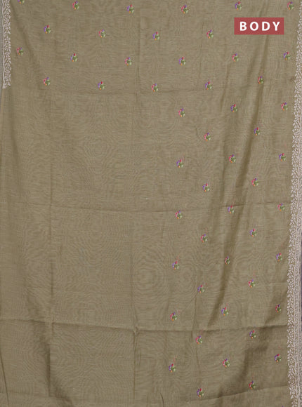Art linen saree elaichi green with allover convent embroidery buttas and embroidery border