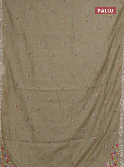 Art linen saree elaichi green with allover convent embroidery buttas and embroidery border