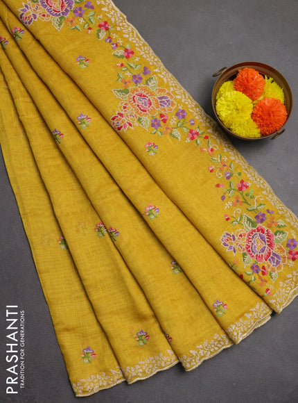 Art linen saree mustard yellow with allover convent embroidery buttas and embroidery border