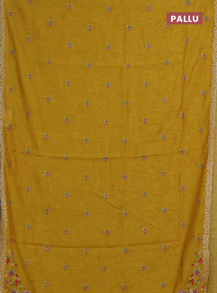 Art linen saree mustard yellow with allover convent embroidery buttas and embroidery border