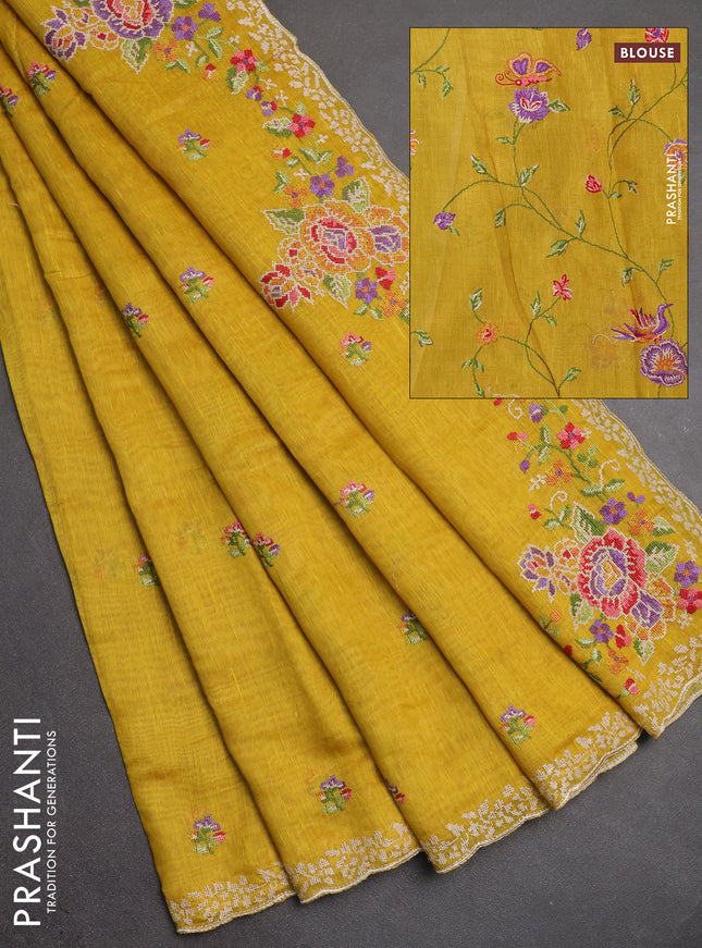 Art linen saree mustard yellow with allover convent embroidery buttas and embroidery border