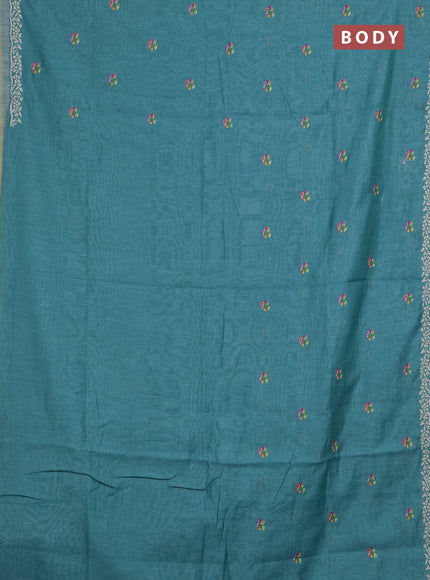 Art linen saree teal blue with allover convent embroidery buttas and embroidery border