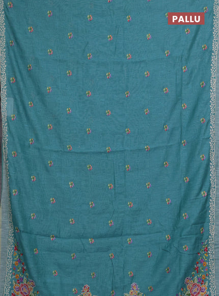 Art linen saree teal blue with allover convent embroidery buttas and embroidery border