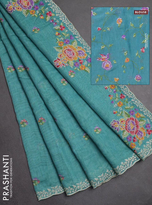Art linen saree teal blue with allover convent embroidery buttas and embroidery border
