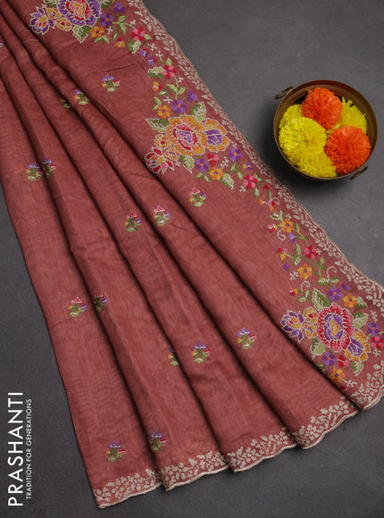 Art linen saree dark peach with allover convent embroidery buttas and embroidery border