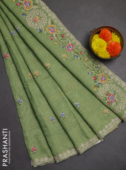 Art linen saree pastel green with allover convent embroidery buttas and embroidery border
