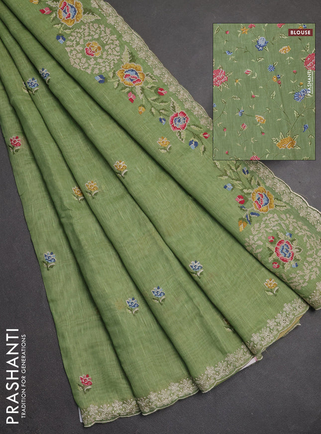 Art linen saree pastel green with allover convent embroidery buttas and embroidery border