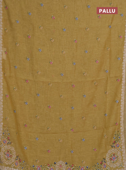 Art linen saree pale yellow with allover convent embroidery buttas and embroidery border