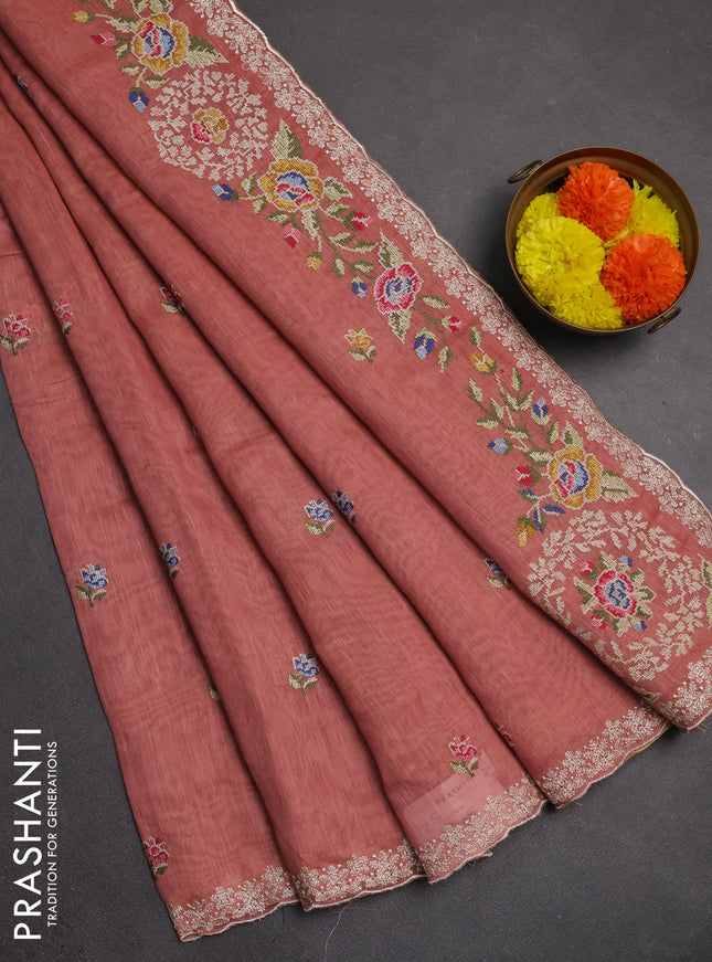 Art linen saree dark peach with allover convent embroidery buttas and embroidery border