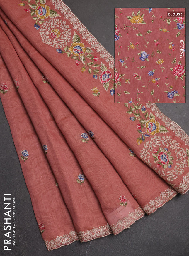 Art linen saree dark peach with allover convent embroidery buttas and embroidery border
