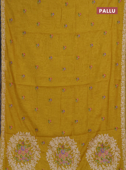 Art linen saree mustard yellow with allover convent embroidery buttas and embroidery border