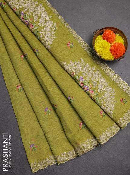 Art linen saree light green with allover convent embroidery buttas and embroidery border