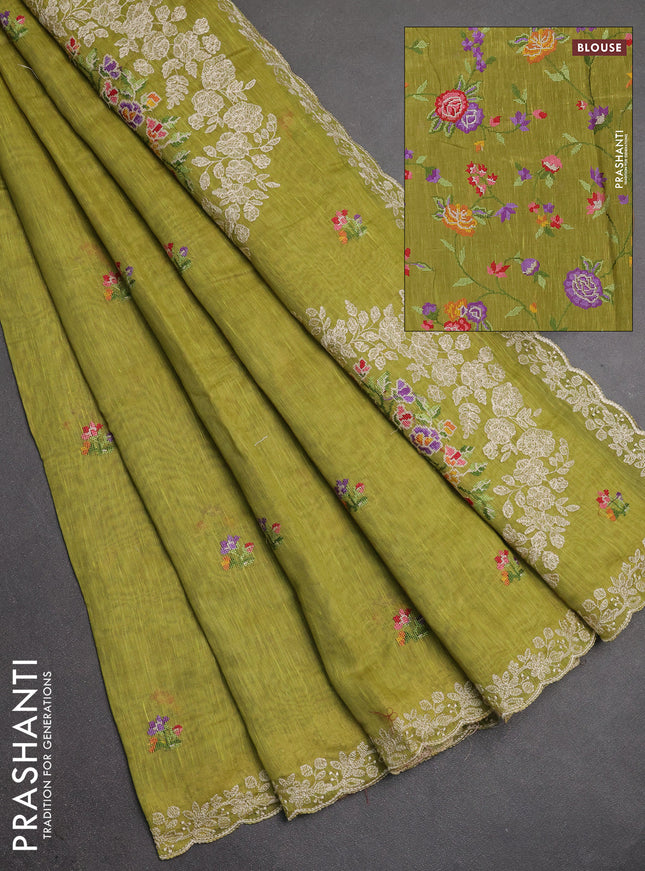 Art linen saree light green with allover convent embroidery buttas and embroidery border