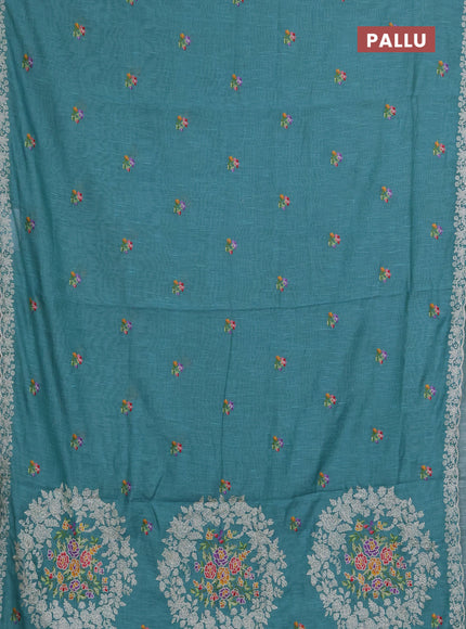 Art linen saree teal blue with allover convent embroidery buttas and embroidery border