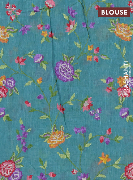 Art linen saree teal blue with allover convent embroidery buttas and embroidery border