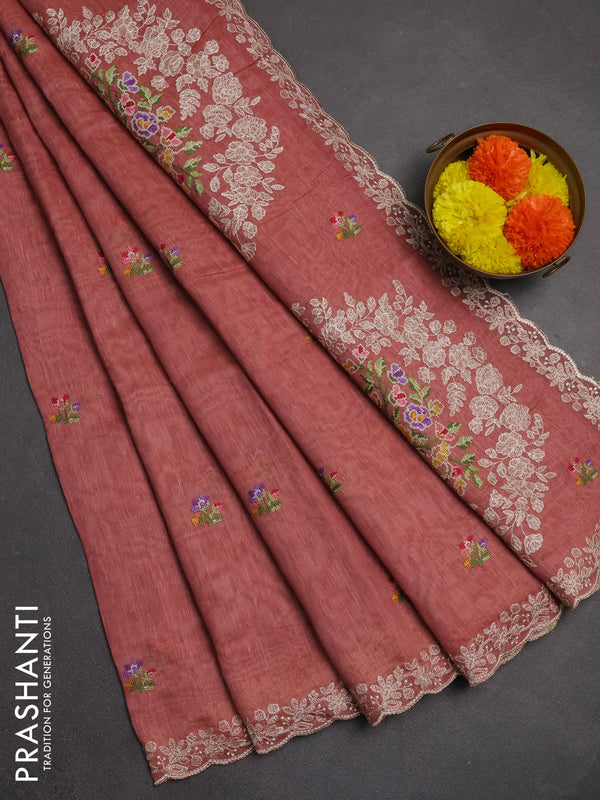 Art linen saree dark peach with allover convent embroidery buttas and embroidery border