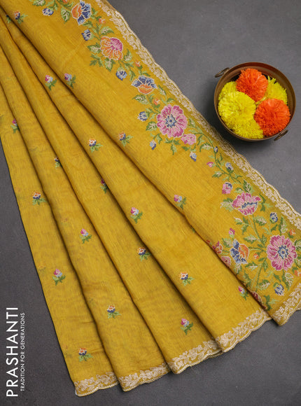 Art linen saree mustard yellow with allover convent embroidery buttas and embroidery border