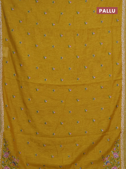 Art linen saree mustard yellow with allover convent embroidery buttas and embroidery border