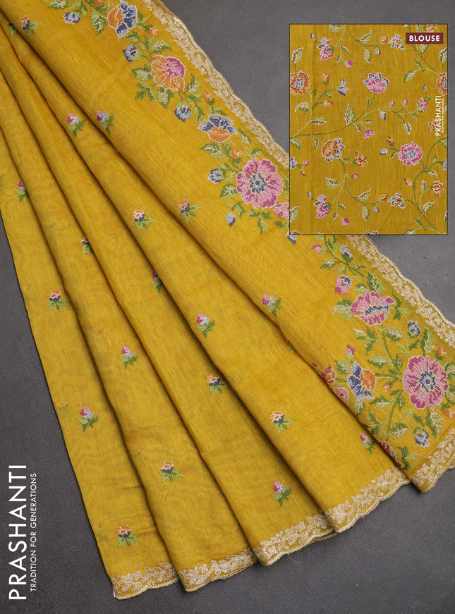 Art linen saree mustard yellow with allover convent embroidery buttas and embroidery border