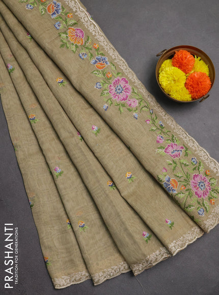 Art linen saree elaichi green with allover convent embroidery buttas and embroidery border