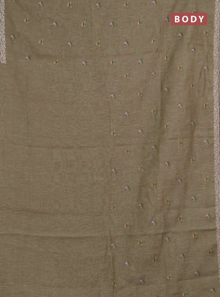 Art linen saree elaichi green with allover convent embroidery buttas and embroidery border