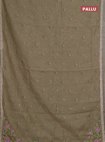 Art linen saree elaichi green with allover convent embroidery buttas and embroidery border