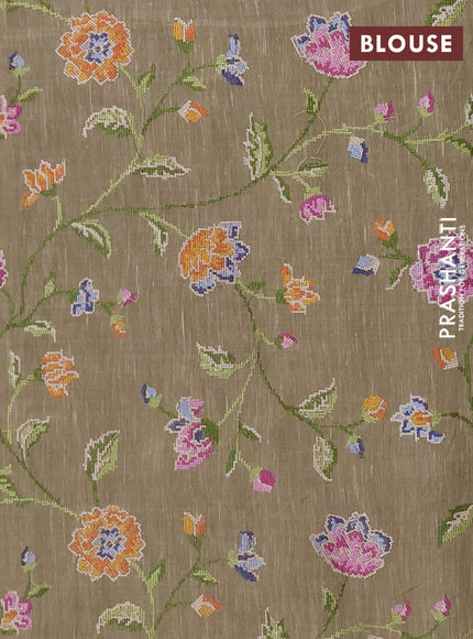 Art linen saree elaichi green with allover convent embroidery buttas and embroidery border
