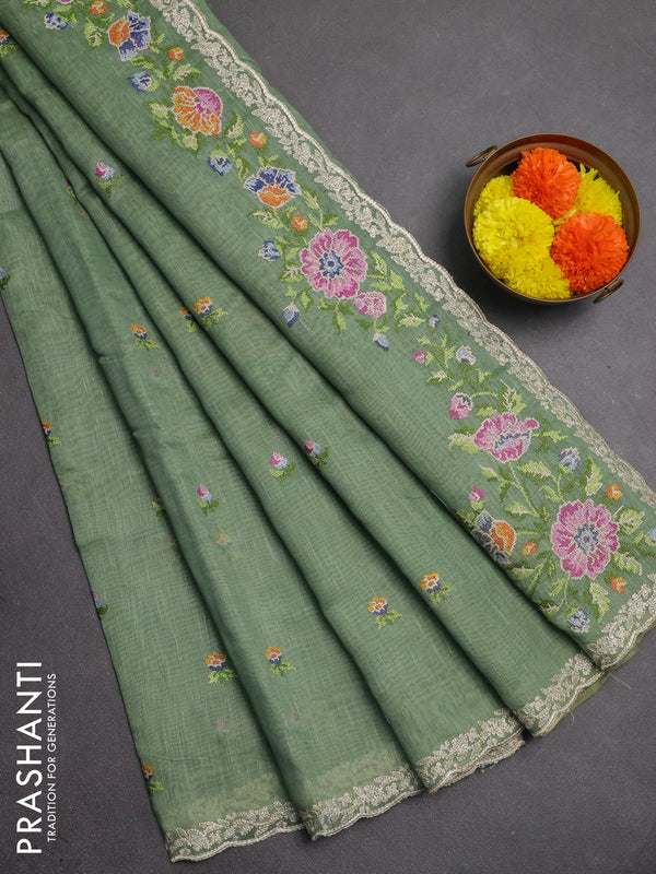 Art linen saree pastel green with allover convent embroidery buttas and embroidery border