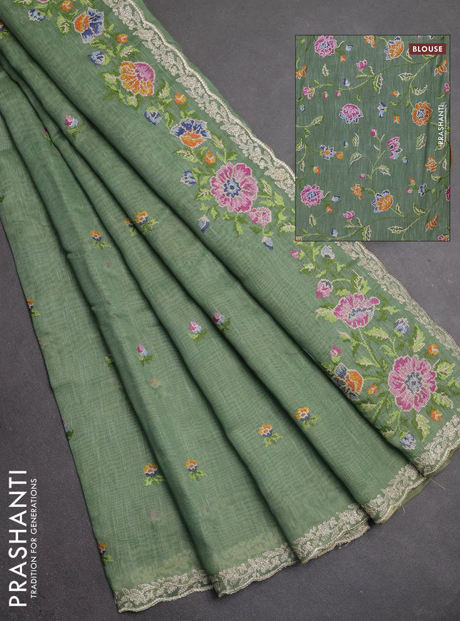 Art linen saree pastel green with allover convent embroidery buttas and embroidery border