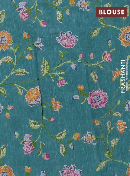 Art linen saree teal blue with allover convent embroidery buttas and embroidery border