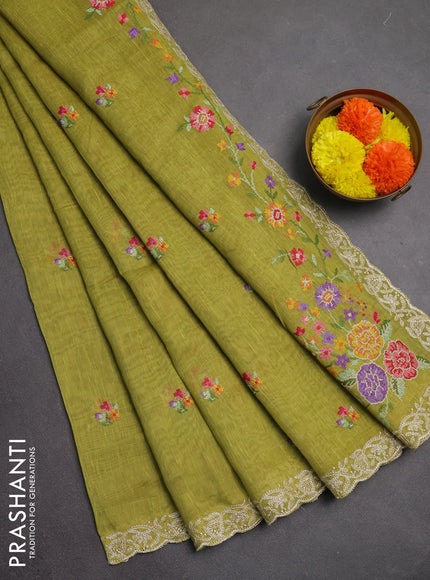 Art linen saree light green with allover convent embroidery buttas and embroidery border