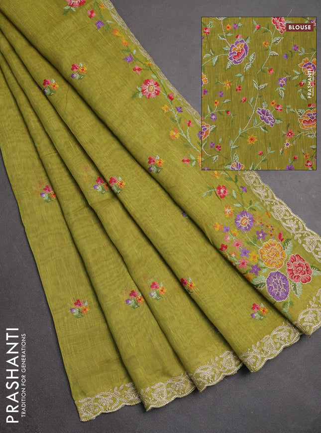 Art linen saree light green with allover convent embroidery buttas and embroidery border